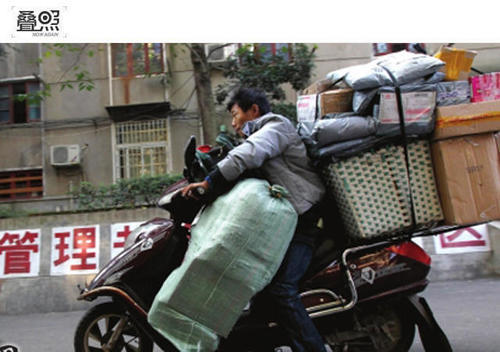 双十一5亿多包裹 快递员收入多少 | 每经网