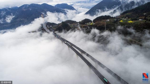 深山峡谷里的全球最长悬索桥:全长1365米(图) | 每经网