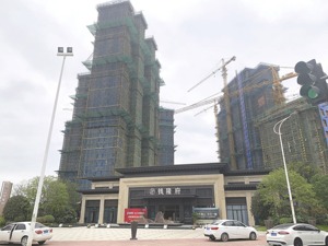 福晟国际亏本卖楼：资金承压年报延期 旗下多项目仍停摆
