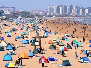 五一旅游数据公布：出游人次恢复至疫情前66.8%，旅游收入恢复至44%