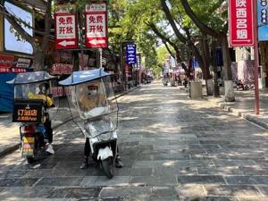 西安街头扫描 谁在热浪中劳动