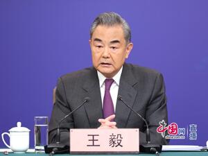 王毅四问美国