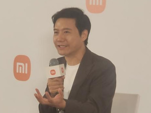 对话雷军：和苹果的竞争漫长而痛苦 国产汽车都在进步，没必要在竞争上搞得很难看