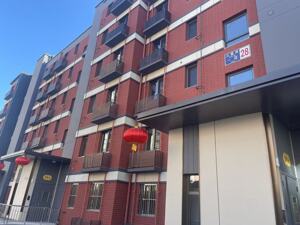 不到6个月住新房、拿新房本，在北京西城原拆原建的新家过春节｜新春走基层