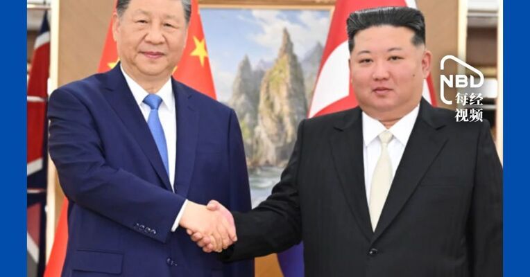 习近平同金正恩举行会谈