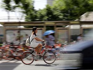 “自行车王国”重现！ 共享经济让国人变“潮”