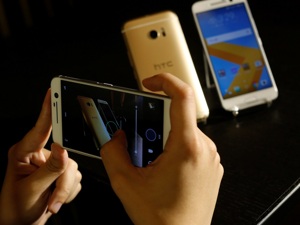 百台旧手机提炼一枚金戒指 全国仅两家企业正规拆解