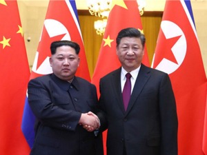 习近平同金正恩举行会谈