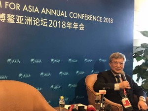 张宇燕在博鳌论坛答每经记者问：中美关系进入质变期 争端蔓延到金融领域可能性小