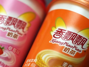 香飘飘上市后首份半年报公布 营收增长净利润陷亏损