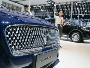 人民币“破7”  买进口车要涨价？