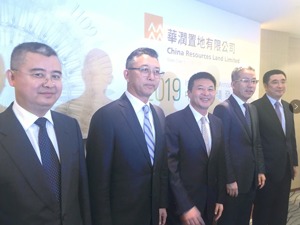 一线城市写字楼空置率升高是否影响华润置地   唐勇：公司的出租率目前比较稳